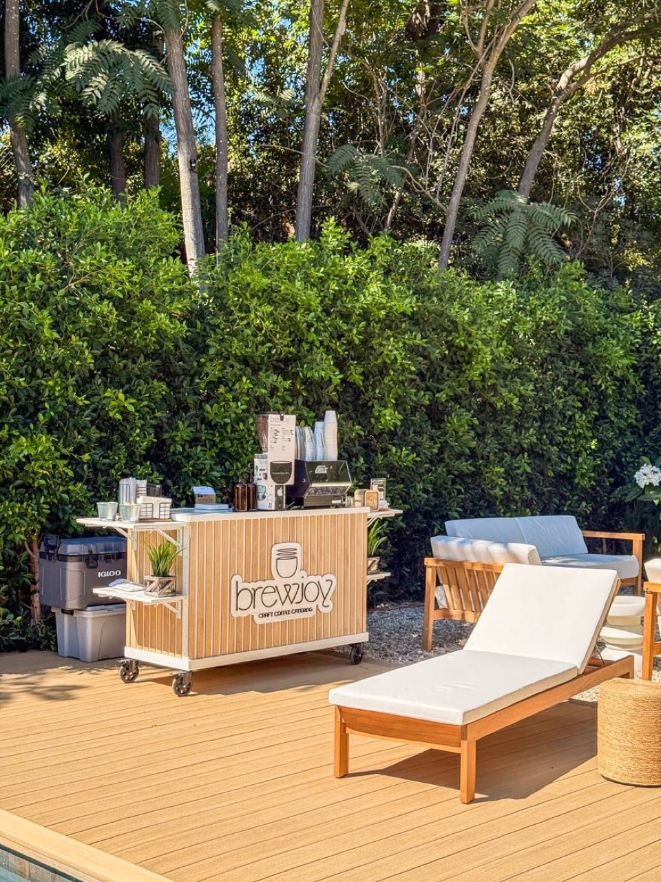 BrewJoy coffee cart set up beside the pool for a private event
